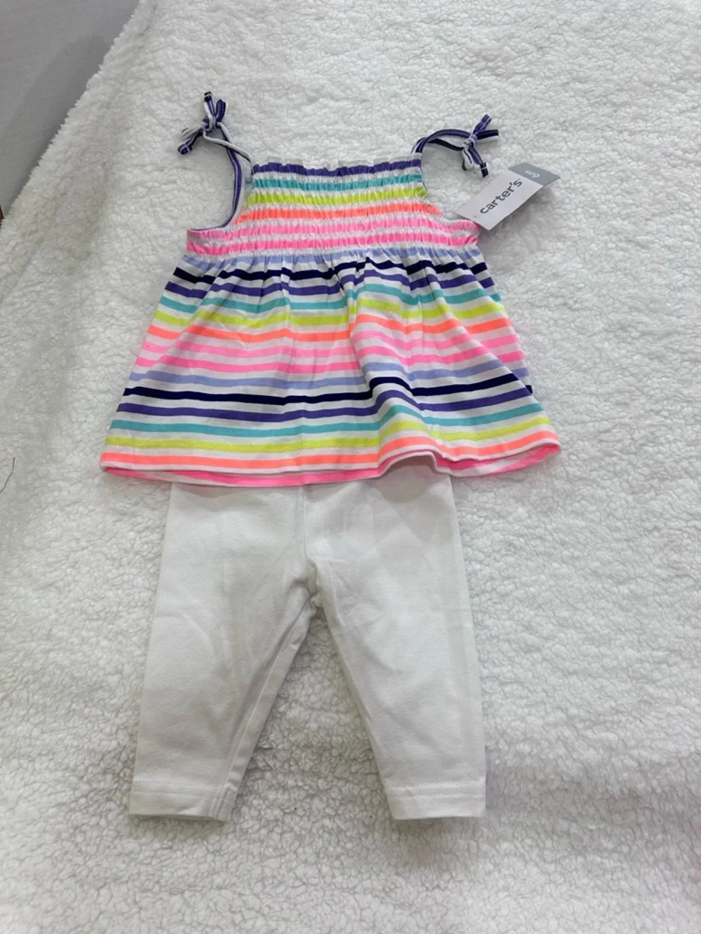 Two infant girl’s Carter’s summer outfits